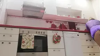 Stepson spy stepmom om the kitchen