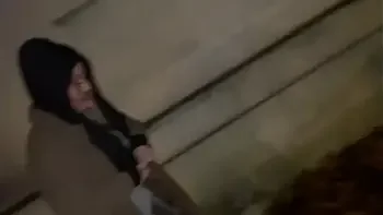 Woman on street gets offered a cigarette to flash and piss in public