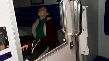 A stranger and a fellow traveler and I cum in a train compartment -