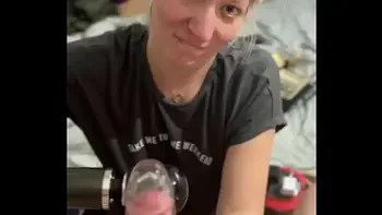 POV Blonde milf gives teasing blowjob inside a transparent cock sleeve