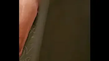 Spying Stepsis masturbating in Shower