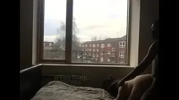 Slut Fucking BBC by the window for everyone to see