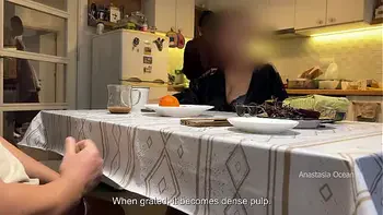 My husband jerking under a table front of my step mom and i right at the kitchen.