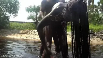 Skinny zulu hottie with perfect tits getting fucked while bathing in the river