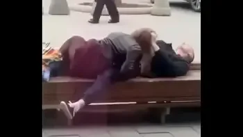 Stupid blonde gives blowjob in public