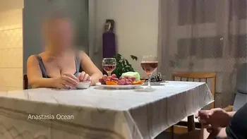 My husband jerking hidden front of my step mom under a table during their talk.