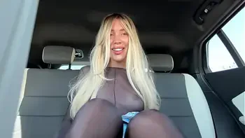 publicly in a car in a bodysuit masturbates and gets a squirt