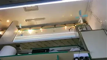 The boss is playing with his sexy shop assistant pussy while she talks to the customer