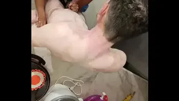 Perverted stepson fucks his own busty stepmother next to the refrigerator