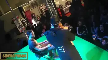 Pornstar interracial fuck on stage with public