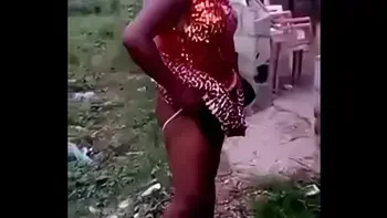 African woman fucks her man in public