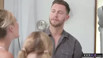 Two petite professionals massage a big cock client