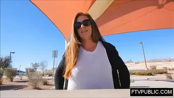 Milf exposes tits in public