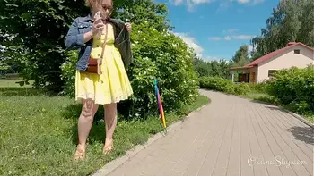 Buttpluged slut in a nature park