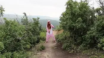 Redhead Fucks Dildo Outside In Dinosaur Costume