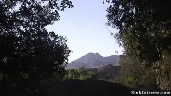 Dude bangs ebony slave in woods