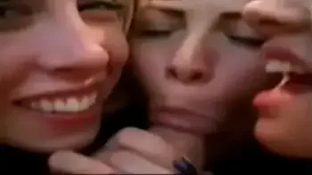 Three hot teen girls give reverse gangbang