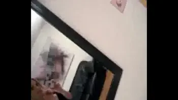 Naked in front of the mirror