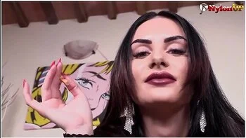 Stunning Ambra Smoking And Footplaying In Black Seamed Nylons