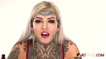 Behind the scenes for Amber Luke's new face tattoo