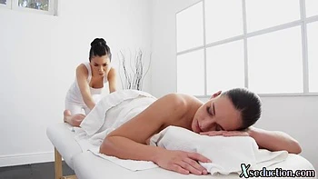 Asian masseue scissoring her lez client