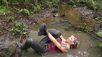 Beautiful Blonde in Leather Leggins and Wellies plays in Mud P2: Amateur, Babe  Ass Porn