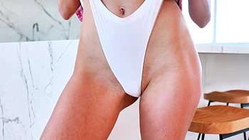 Hot Fibi Euro wanking her pussy in the kitchen.