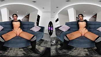 Skinny Breiny Zoe masturbates her shaved pussy wearing only socks.