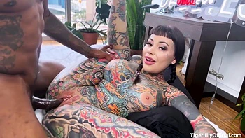 Personal With Tattooed Hottie With Tiger Lilly