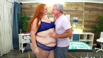 Redheaded BBW Julie Ginger Gets Massaged