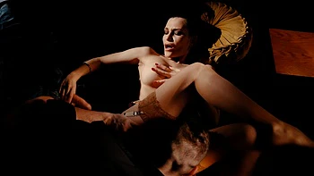 Subil Arch is a sexy flirt in stockings who plays with fire and water.