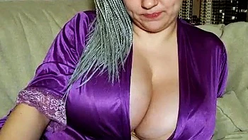 Busty curly brunette with big boobs fucks on couch