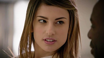 Skinny babe gives a blowjob while being doggystyle fucked by a big black cock