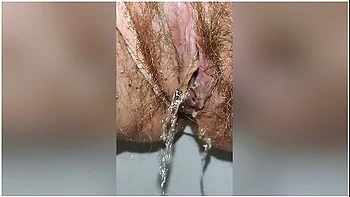Hairy Pussy In Pink Panties Pissing Close Up