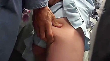 A cosplay girl is fucked on a train with a vibrator, making her squirt, and then he thrusts it deep into her throat.