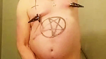 Satan slave takes a perverted piss enema