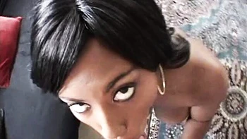 Impressive ebony brunette Candace Von is sucking a big white dick