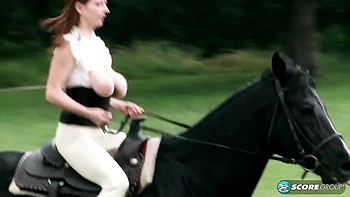 Busty brunette Melissa Mandlikova is having fun with her lovely horse