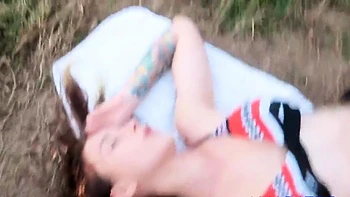 Big-Titted Babe Blows a Nerd on the Beach
