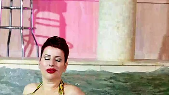 Busty MILF Lisa Pinelli in an Intimate Solo Scene