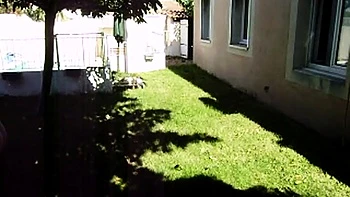 Outdoor solo masturbation scene with curly blonde