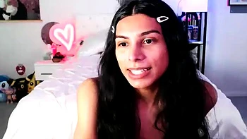 Small titted brunette Sharron with glasses masturbates