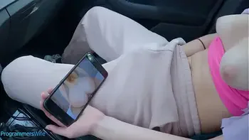 Teen masturbates on a public car park watching her porn video - ProgrammersWife