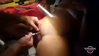 nippleringlover hot stretching labia piercings with 10mm tapers extreme nipple piercings