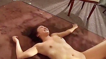 She is restrained, penetrated, her head is held down, and she is forced to take it deep into her throat.