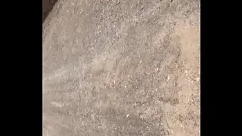 Two lesbians touch each other to orgasm on the corner of a town trying to avoid being seen by anyone