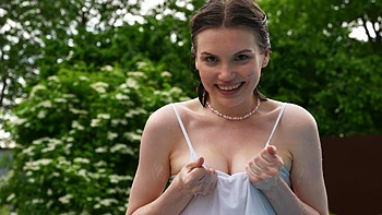 Brunette teen Milka Wey masturbating her pussy in shorts