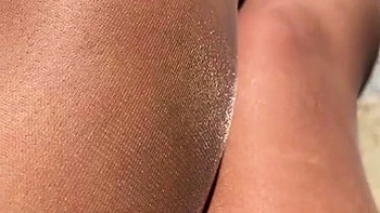 MILF in fishnet enjoys foot fetish