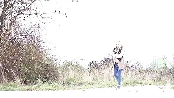 Outdoor solo pissing with a long-haired blonde Bianca Ferrera